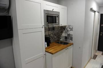 Фото номера Номер-студио полулюкс Апарт-отели Heights Accommodation City Center г. Бухарест 5