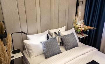 Фото номера Двухместный номер Делюкс с 1 кроватью Отель Union Plaza Hotel г. Бухарест 12