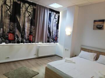 Фото номера Двухместный номер с 1 кроватью Отель Hotel Tomi г. Бухарест 2