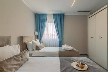 Фото номера Двухместный номер Делюкс с 2 отдельными кроватями Отель New Era Hotel г. Бухарест 6