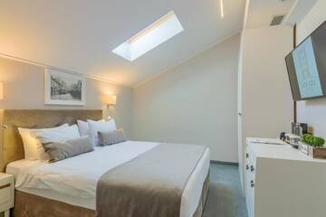 Фото номера Attic Deluxe Double Room Отель New Era Hotel г. Бухарест 5
