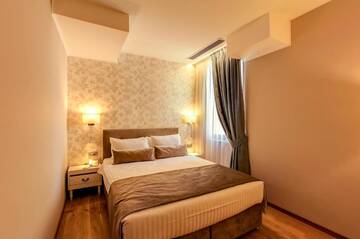 Фото номера Двухместный номер Делюкс с 1 кроватью Отель New Era Hotel г. Бухарест 29