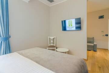 Фото номера Двухместный номер Делюкс с 1 кроватью Отель New Era Hotel г. Бухарест 8