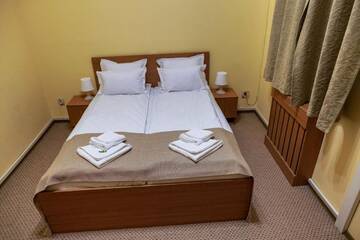 Фото номера Двухместный номер эконом-класса с 1 кроватью Отель Bucharest Downtown Inn г. Бухарест 8