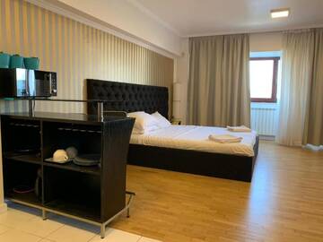 Фото номера Апартаменты с террасой Отели типа «постель и завтрак» Penthouse Group Fountain г. Бухарест 11