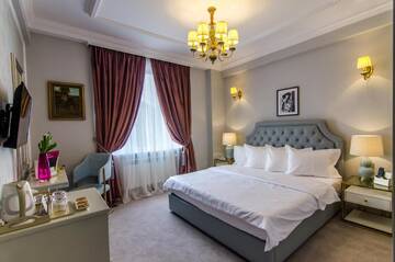 Фото номера Номер Делюкс с кроватью размера «king-size» Отель Hotel Lido by Phoenicia г. Бухарест 4