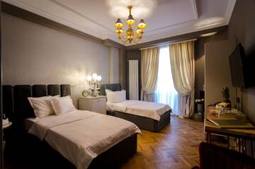 Фото номера Двухместный номер Делюкс с 2 отдельными кроватями Отель Hotel Lido by Phoenicia г. Бухарест 4