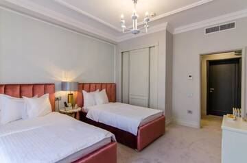 Фото номера Двухместный номер Делюкс с 2 отдельными кроватями Отель Hotel Lido by Phoenicia г. Бухарест 2