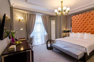 Фото номера Номер Делюкс с кроватью размера «king-size» Отель Hotel Lido by Phoenicia г. Бухарест 5