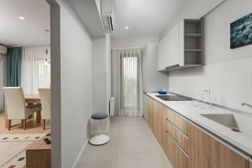 Фото номера Семейный номер с балконом Отель Athina Suites Hotel г. Бухарест 12