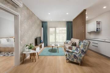 Фото номера Двухместный номер с 1 кроватью и балконом Отель Athina Suites Hotel г. Бухарест 12