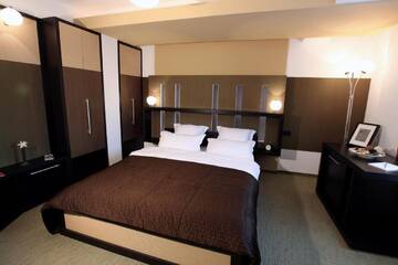 Фото номера Двухместный номер с 1 кроватью Отель Ambiance Hotel г. Бухарест 4