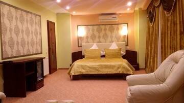 Фото номера Номер-студио Делюкс Отель Byblov Rooms Boutique г. Бухарест 2