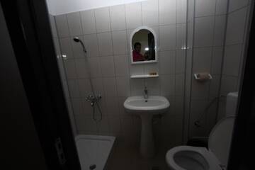 Фото номера Двухместный номер с 1 кроватью или 2 отдельными кроватями Отель Hotel Basarab г. Бухарест 12