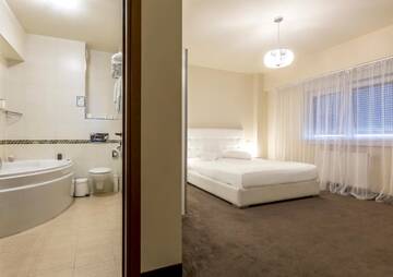 Фото номера Просторные апартаменты без спа Отель Orhideea Residence &amp; Spa г. Бухарест 9