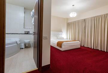 Фото номера Стандартные апартаменты без спа Отель Orhideea Residence &amp; Spa г. Бухарест 5