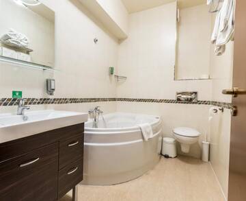 Фото номера Стандартные апартаменты без спа Отель Orhideea Residence &amp; Spa г. Бухарест 4