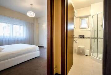 Фото номера Просторные апартаменты без спа Отель Orhideea Residence &amp; Spa г. Бухарест 5