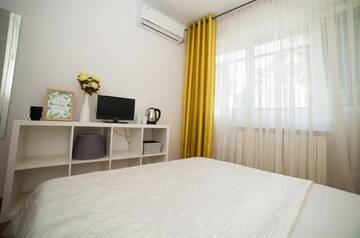 Фото номера Двухместный номер Делюкс с 1 кроватью Гостевой дом Smart Rooms Bucharest г. Бухарест 3