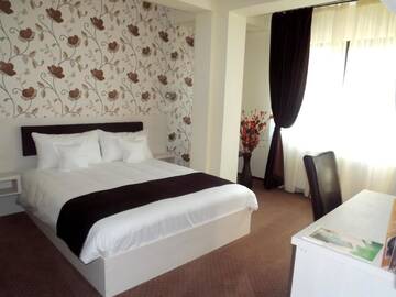Фото номера Двухместный номер с 1 кроватью Отель West Plaza Residence г. Бухарест 3