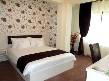 Фото номера Двухместный номер с 1 кроватью Отель West Plaza Residence г. Бухарест 4