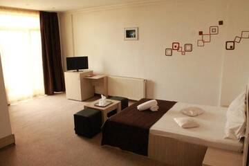 Фото номера Стандартный двухместный номер с 1 кроватью Отель Hotel Mon Caprice г. Бухарест 12