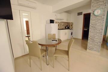 Фото номера Стандартный номер-студио Апарт-отели Decebal Residence Apartments г. Бухарест 6