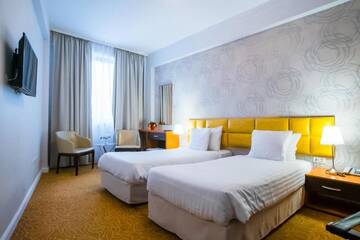 Фото номера Двухместный номер с 2 отдельными кроватями Отель Best Western Hotel Lev Or I г. Бухарест 9