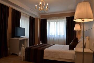 Фото номера Стандартный двухместный номер с 1 кроватью Отель Old City Bucharest NF Hotels г. Бухарест 8