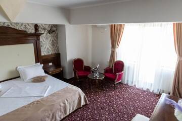 Фото номера Стандартные апартаменты Отель Hotel Giuliano г. Бухарест 23