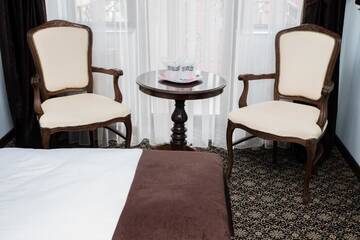 Фото номера Стандартный номер с кроватью размера &quot;king-size&quot; Отель Hotel Giuliano г. Бухарест 6