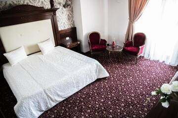 Фото номера Стандартные апартаменты Отель Hotel Giuliano г. Бухарест 4