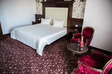 Фото номера Стандартные апартаменты Отель Hotel Giuliano г. Бухарест 2