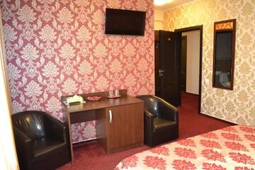 Фото номера Двухместный номер Делюкс с 1 кроватью Отель Hotel Athos г. Бухарест 24