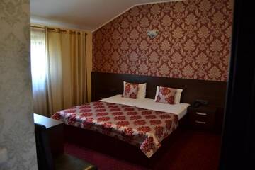 Фото номера Двухместный номер Делюкс с 1 кроватью Отель Hotel Athos г. Бухарест 22