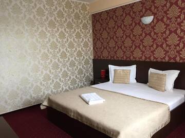 Фото номера Двухместный номер Делюкс с 1 кроватью Отель Hotel Athos г. Бухарест 26