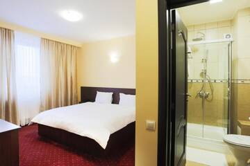 Фото номера Двухместный номер Делюкс с 1 кроватью Отель Hotel Athos г. Бухарест 27