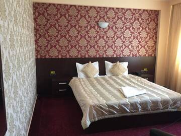 Фото номера Двухместный номер Делюкс с 1 кроватью Отель Hotel Athos г. Бухарест 31
