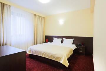Фото номера Двухместный номер Делюкс с 1 кроватью Отель Hotel Athos г. Бухарест 28
