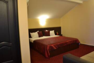Фото номера Семейный номер (для 3 взрослых) Отель Hotel Athos г. Бухарест 3