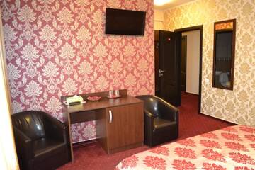 Фото номера Двухместный номер Делюкс с 1 кроватью Отель Hotel Athos г. Бухарест 10
