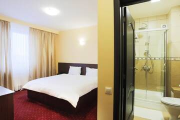 Фото номера Двухместный номер Делюкс с 1 кроватью Отель Hotel Athos г. Бухарест 15