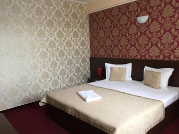 Фото номера Двухместный номер Делюкс с 1 кроватью Отель Hotel Athos г. Бухарест 16