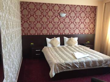 Фото номера Двухместный номер Делюкс с 1 кроватью Отель Hotel Athos г. Бухарест 17