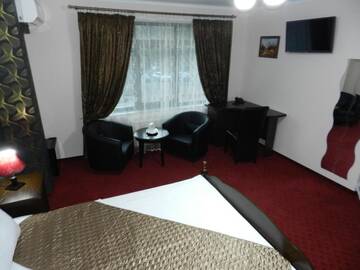 Фото номера Двухместный номер Делюкс с 1 кроватью Отель Hotel Marinii г. Бухарест 5
