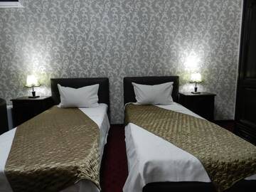 Фото номера Двухместный номер с 2 отдельными кроватями Отель Hotel Marinii г. Бухарест 3
