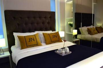 Фото номера Апартаменты с 1 спальней Апарт-отели JN Boutique Apartments г. Бухарест 14