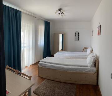 Фото номера Двухместный номер с 2 отдельными кроватями Отель Hotel Nova Residence г. Бухарест 6
