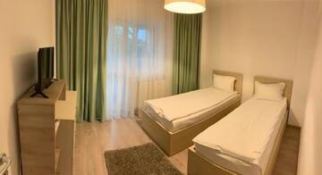 Фото номера Двухместный номер с 2 отдельными кроватями Отель Hotel Nova Residence г. Бухарест 7
