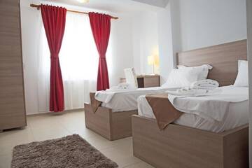 Фото номера Двухместный номер с 2 отдельными кроватями Отель Hotel Nova Residence г. Бухарест 10